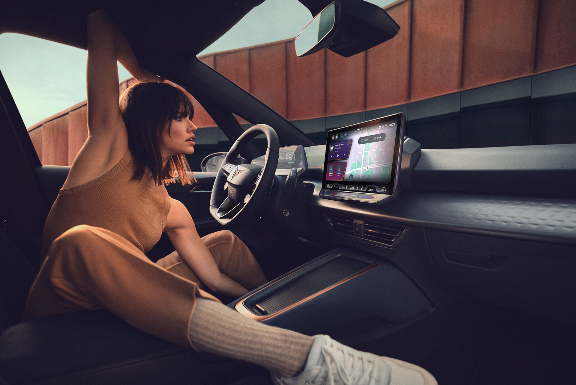 CUPRA Born 2024 - Tecnologia del tauler i estofament blau.