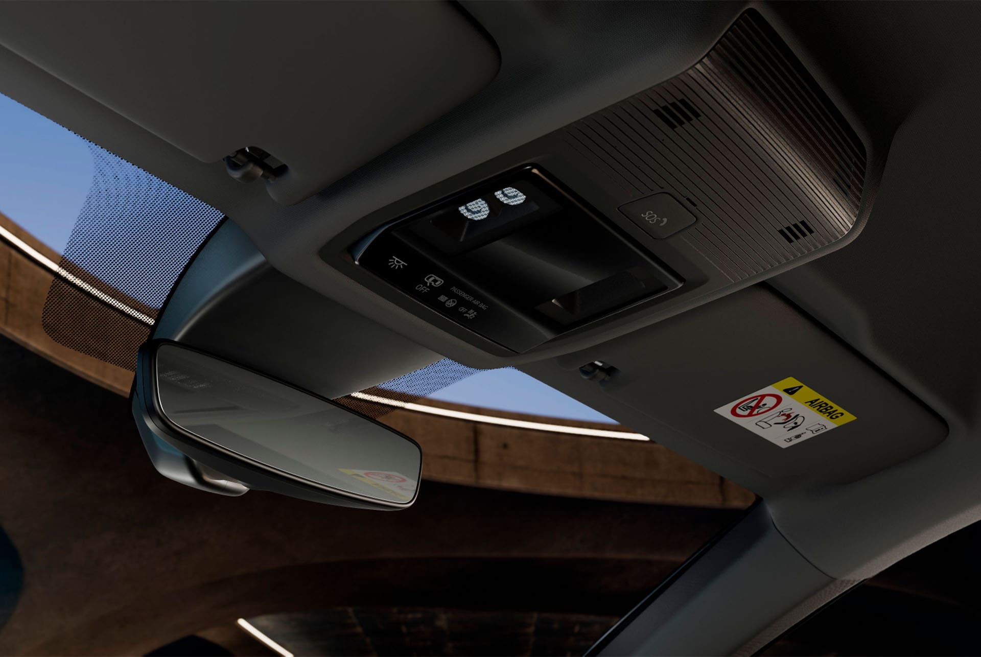 Vista interior del nou Cupra Formentor 2025, on es veu la consola superior amb mirall retrovisor, llums LED de l'habitacle, diversos comandaments i funcions de connectivitat CUPRA, inclòs un botó d'emergència SOS.