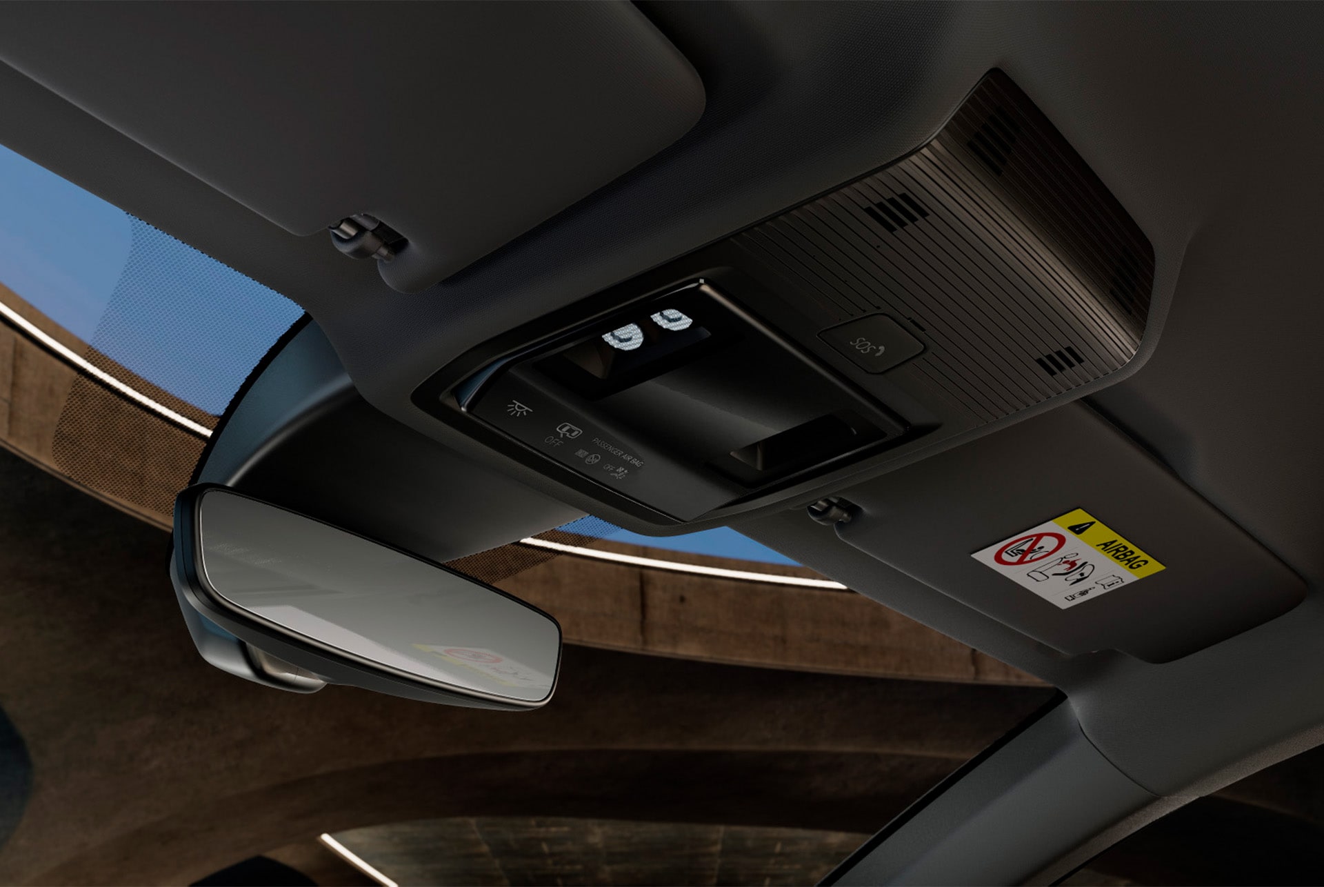 Vista interior del nou Cupra Leon Sportstourer 2025, on es veu la consola superior amb mirall retrovisor, llums LED de l'habitacle, diversos comandaments i funcions de connectivitat Cupra, inclòs un botó d'emergència SOS.