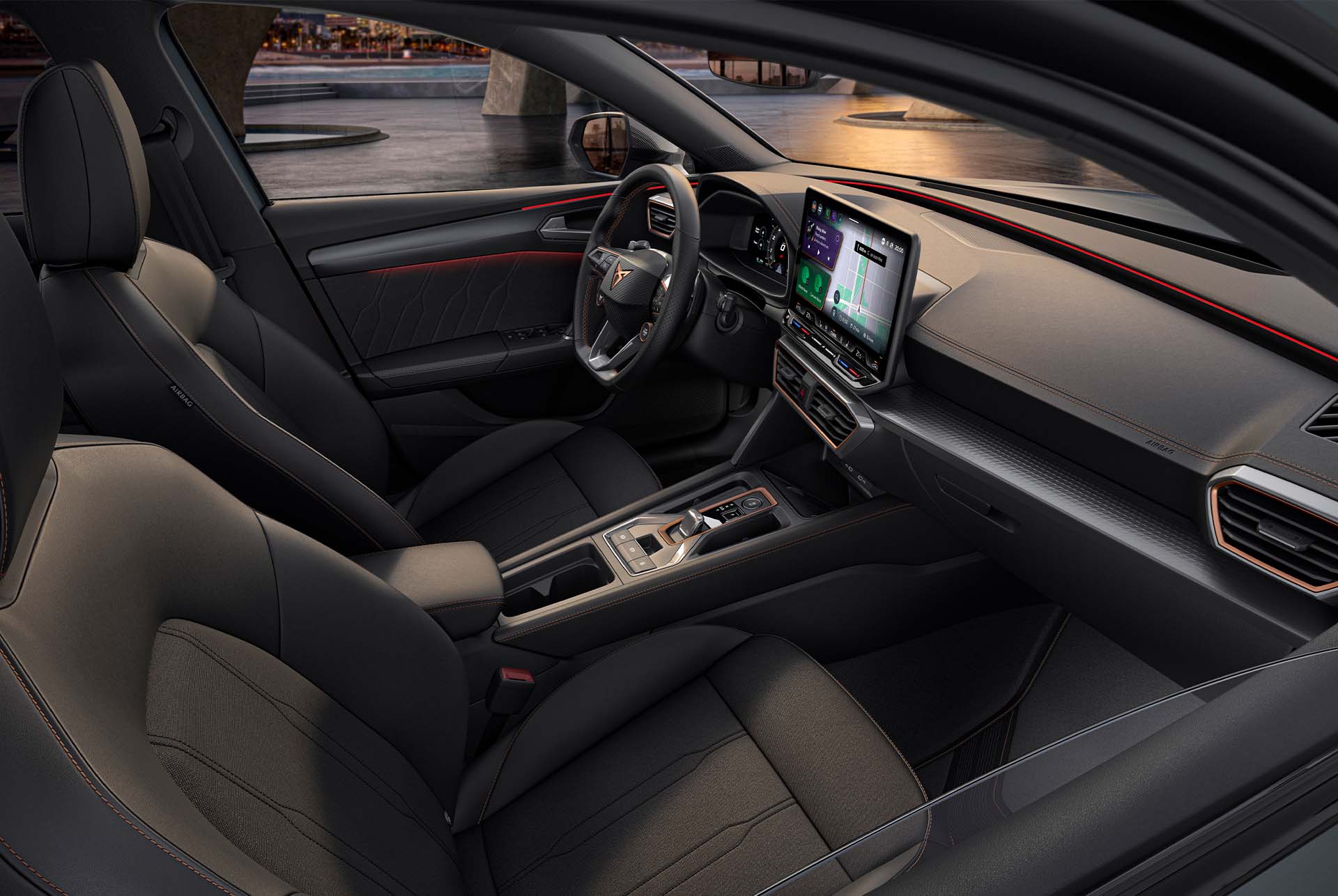 Disseny interior Dynamic del nou CUPRA Leon 2025, seients bucket esportius, il·luminació ambiental, infotainment . 