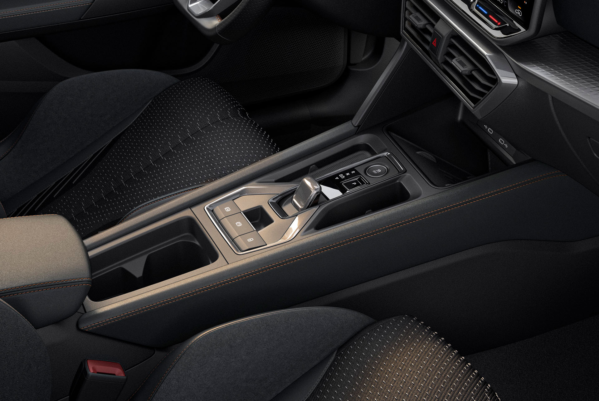 Disseny interior de la nova consola central dels cotxes híbrids Cupra Leon 2025, controls de connexió de cupra, costures en  coure, rivet negre i metàl·lic.