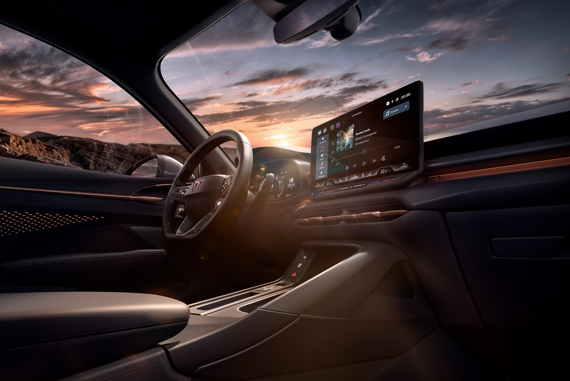 Tecnologia interior del nou CUPRA Terramar 2025, incloent un sistema d'informació i entreteniment de 12,9 polzades, volant calefactat amb botons satèl·lit i consola central. Vista del tauler de control.