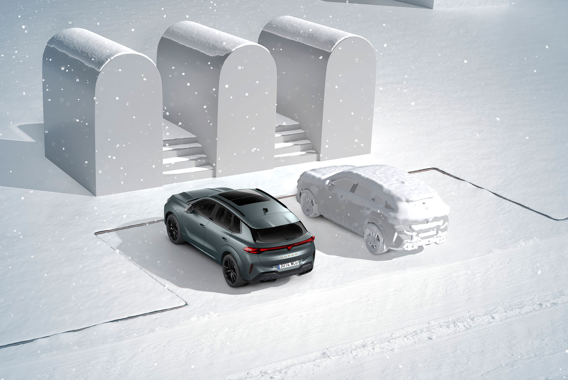 CUPRA Terramar en color Gris Enceladus mat estacionat en condicions de neu, amb el sistema de calefacció d’aparcament per proporcionar calidesa en dies freds, controlat a través de comandament a distància.